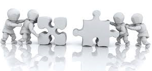 mannequins pushing puzzle pieces